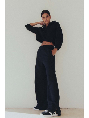 Памучен спортен панталон MUUV. Fin Cotton в черно с изчистен дизайн