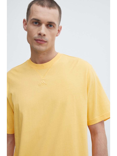 Памучна тениска adidas в жълто с изчистен дизайн IR9114