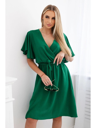 Women's dress with a plunging neckline - green
