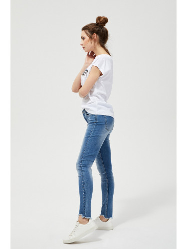 Skinny jeans with decorative rhinestones