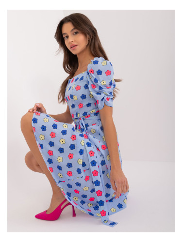 Light blue knee-length dress with a floral pattern