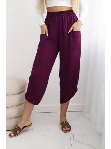 Wide-leg trousers with plum pockets