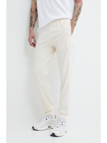 Спортен панталон adidas Originals Adicolor Classics SST в бяло с апликация IR9878