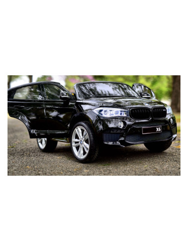 Двуместен джип Лицензиран  BMW X6M 12V C  MP3 с меки гуми с 