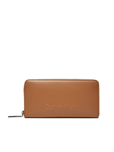 Calvin Klein Голям дамски портфейл Embossed Logo Zip Lg Wallet K60K612439 Кафяв