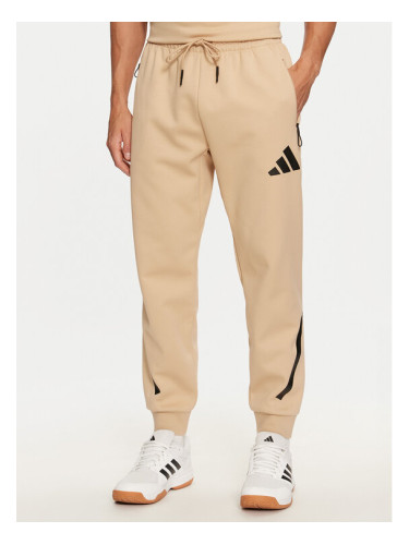 adidas Долнище анцуг Z.N.E. JE7539 Бежов Regular Fit