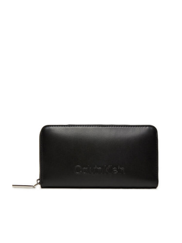 Calvin Klein Голям дамски портфейл Embossed Logo Zip Lg K60K612439 Черен