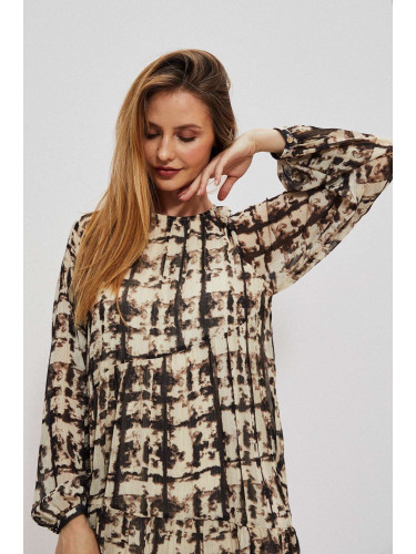 dress with a patterned print and a ruffle