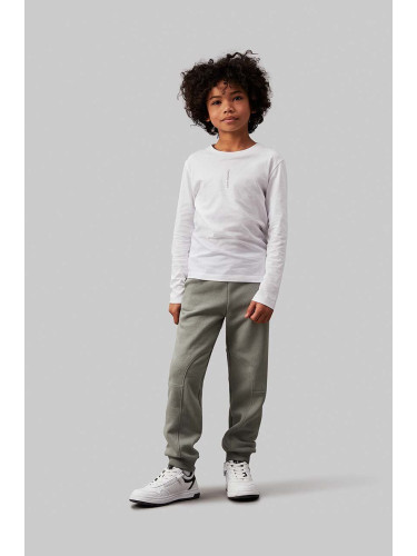 Детски спортен панталон Calvin Klein Jeans FLEECE JOGGER в зелено с изчистен дизайн IB0IB02123