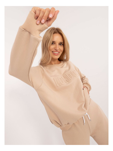 Beige women's tracksuit with inscription