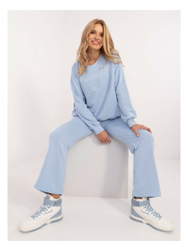 Light blue women's tracksuit with inscription